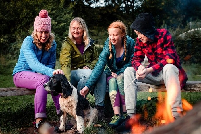 people gathered around a campfire