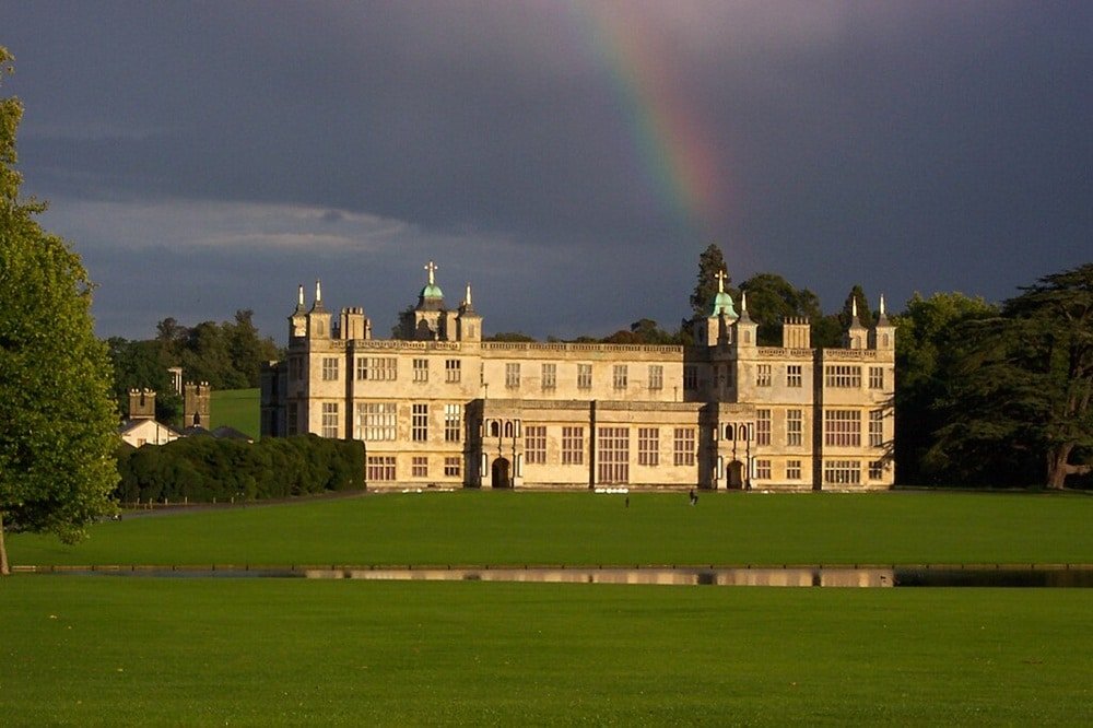 A rainbow over a stately mansion owned by English Heritage